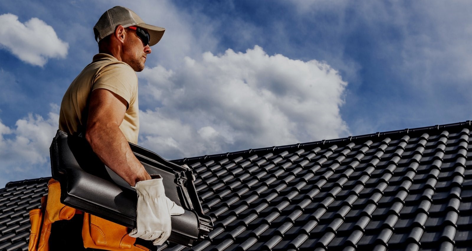 roofing-worker-with-a-ceramic-roof-tiles-in-his-ha-2024-05-02-21-04-22-utc